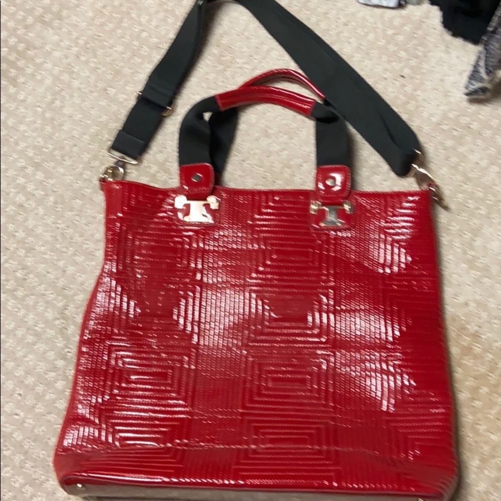 Hip red purse with shoulder strap.  Used once.